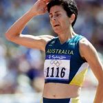 Sue Hobson finishing marathon at Sydney Olympics