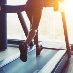 Fitness-girl-running-on-treadmill