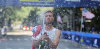 On a sunny Sunday afternoon, Scotsman Josh Kerr of the Brooks Beasts Track Club set a new standard in American road racing. Kerr, the Olympic 1500m silver medalist, claimed victory at the 43rd New Balance Fifth Avenue Mile with an impressive time of 3:44.3, breaking Sydney Maree’s long-standing record from 1981 of 3:47.52.