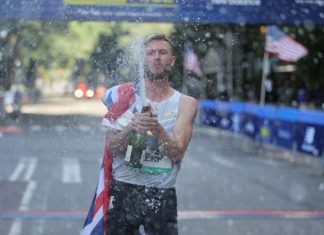 On a sunny Sunday afternoon, Scotsman Josh Kerr of the Brooks Beasts Track Club set a new standard in American road racing. Kerr, the Olympic 1500m silver medalist, claimed victory at the 43rd New Balance Fifth Avenue Mile with an impressive time of 3:44.3, breaking Sydney Maree’s long-standing record from 1981 of 3:47.52.