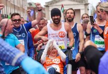 Colin Farrell runs the Dublin Marathon’s last stretch, pushing friend Emma Fogarty with EB, while Moses Kemei and Asmirach Nega win the races.